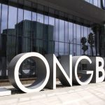 A large installation reads "Long Beach" in front of a glass-walled building.